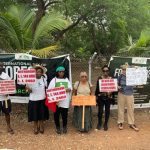 Eco-Conscious Citizens Founder and Director Awula Serwah (2nd from L) with Eco-Conscious members marking World Forests Day