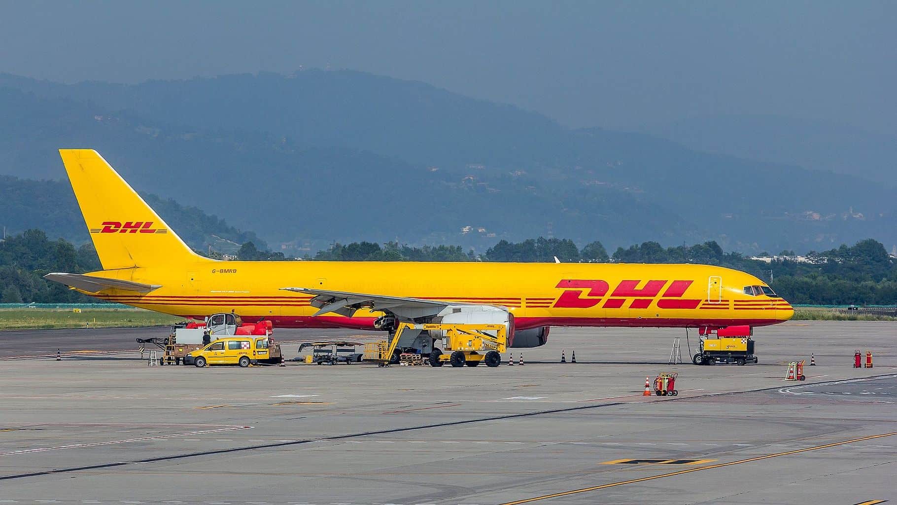 DHL Express is suspending deliveries to the US worth more than $800 (£603) because of a "significant increase" in red tape at customs following the introduction of President Donald Trump's new tariff regime.