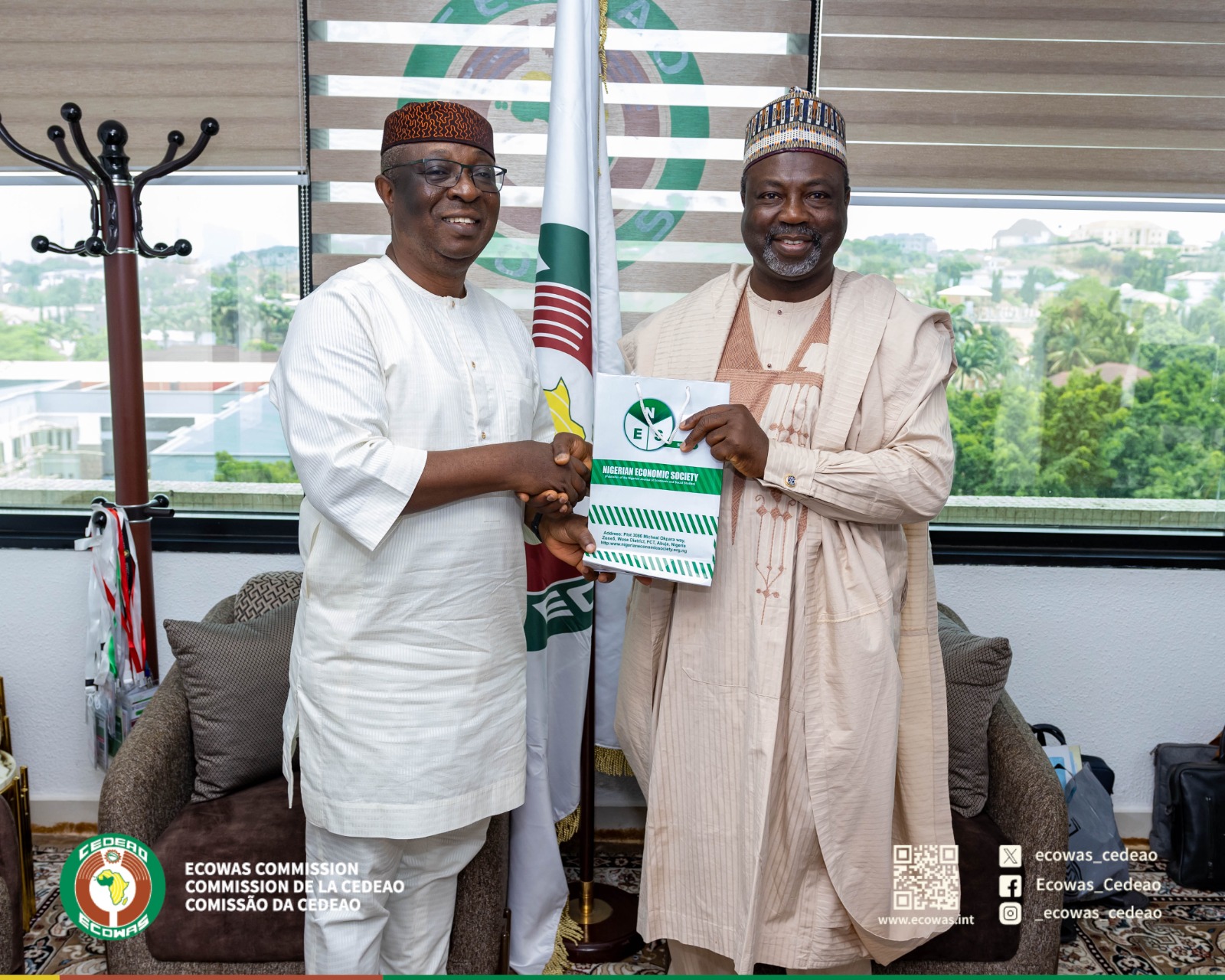 Professor Adeola Adenikinju, President Nigerian Economic Society (NES) (R) meets Professor Nazifi Abdullahi Darma, (L) Commissioner, Internal Services (CIS), ECOWAS Commission,