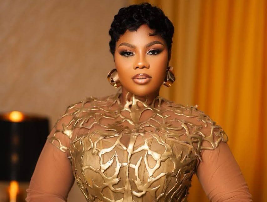 Empress Gifty in dazzling gold dress at TGMA 26