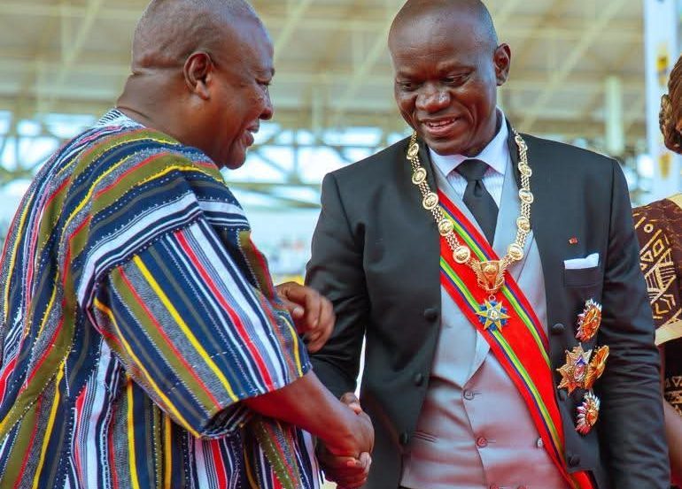 Ghana's President John Dramani Mahama (in smock) at inauguration ceremony of Gabonese f Gabonese President-elect General Brice Clotaire Oligui Nguema.