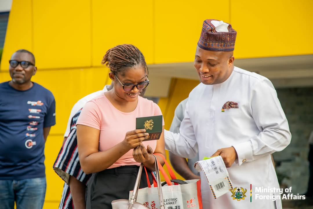Foreign Affairs Minister, Okudzeto Ablakwa delivers passport to applicant at her location.