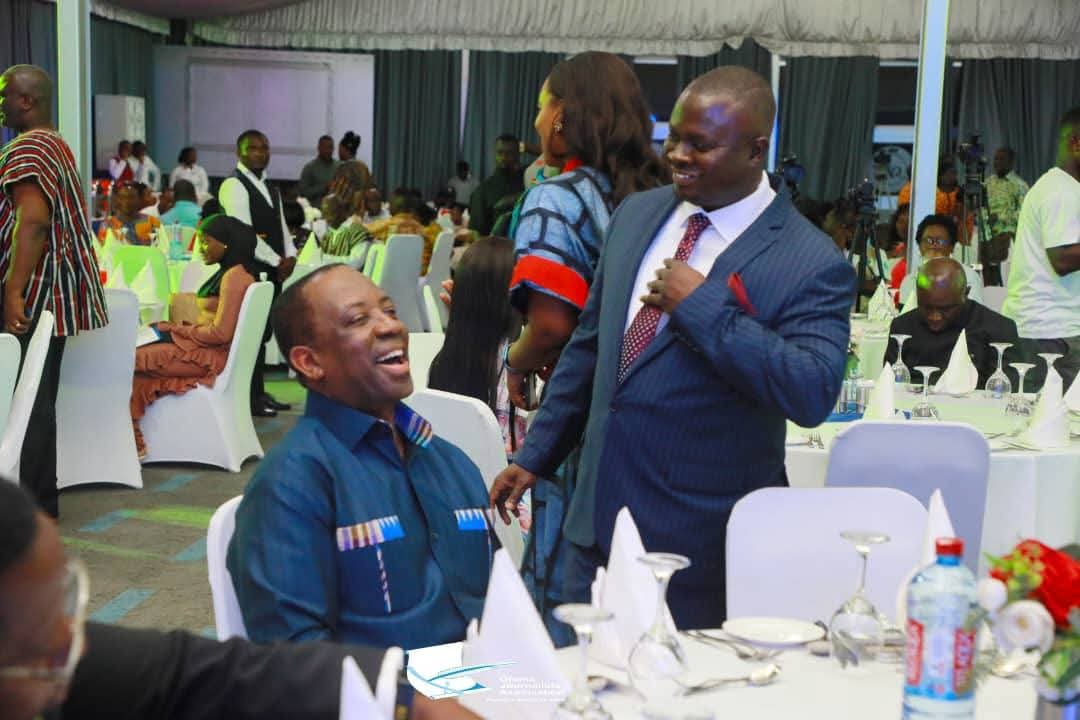 CEO of the Year Alex Apau Adadey (sitting) shares hearty moment with GJA Presuident Albert Dumfour at a Media Event at Alisa Hotel in Accra.