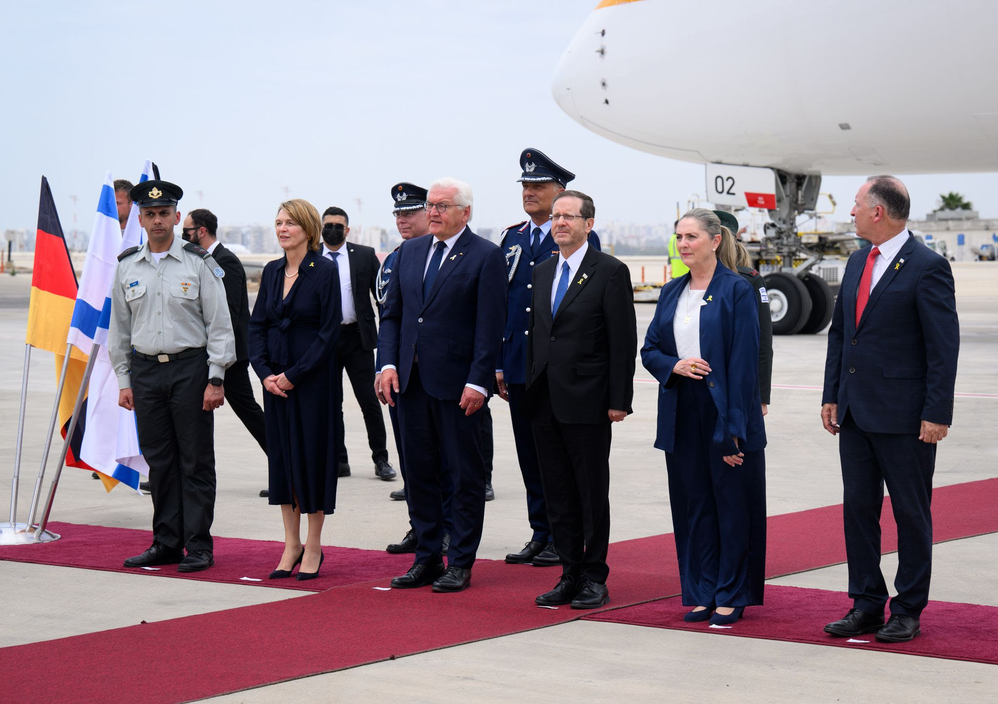 German President Frank-Walter Steinmeier and his wife Elke Buedenbender arrive at Ben Gurion Airport, where he is greeted with military honors by Israeli President Izchak Herzog. Steinmeier and his wife are on a two-day visit to Israel to mark 60 years of diplomatic relations between Germany and Israel. The visit follows a recent trip by Herzog and his wife to Germany