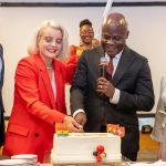 Minister of Local Government, Chieftaincy and Religious Affairs, Ahmed Ibrahim, (R) highlighted with Swiss Ambassador, Simone Giger(in Red) highlighting benefits of new Cooperation Programme.
