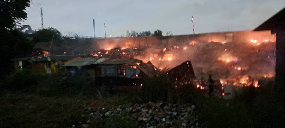 The wooden structures, which served both domestic and commercial purposes, caught fire in the late hours of Wednesday; however, no injuries or fatalities were recorded. 
