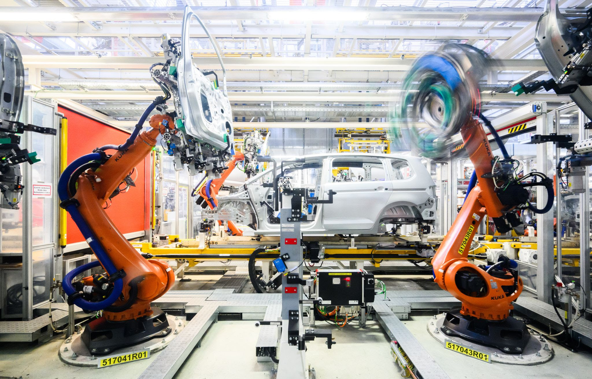 Robots work at a factory in Wolfsburg. The German robotics and automation industry expects its turnover to slump by 10% to €14.5 billion (about $16.5 billion) in the current year.