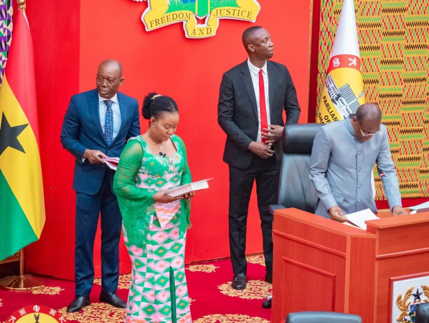 Speaker of Parliament, Alban Bagbin,(L) admonishes newly= sworn-in Member of Parliament, Ewurabena Aubynn.