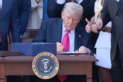 President Donald Trump signed his package of tax breaks and spending cuts into law Friday after his cajoling produced almost unanimous Republican support in Congress for the domestic priority that could cement his second-term legacy