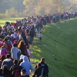 refugees-line-officials-Middle-East-Slovenia-Iraq-October-25-2015