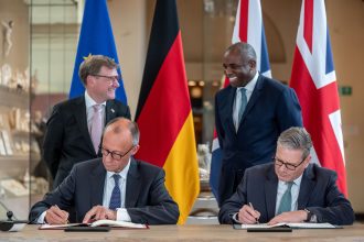 German Chancellor Friedrich Merz and UK Prime Minister Keir Starmer sign a new friendship treaty.