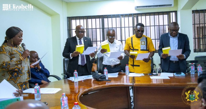 Minister for Trade, Agribusiness and Industry, Elizabeth Ofosu-Adjare (left) inaugurating Interim Committee on Komenda Sugar Factory.