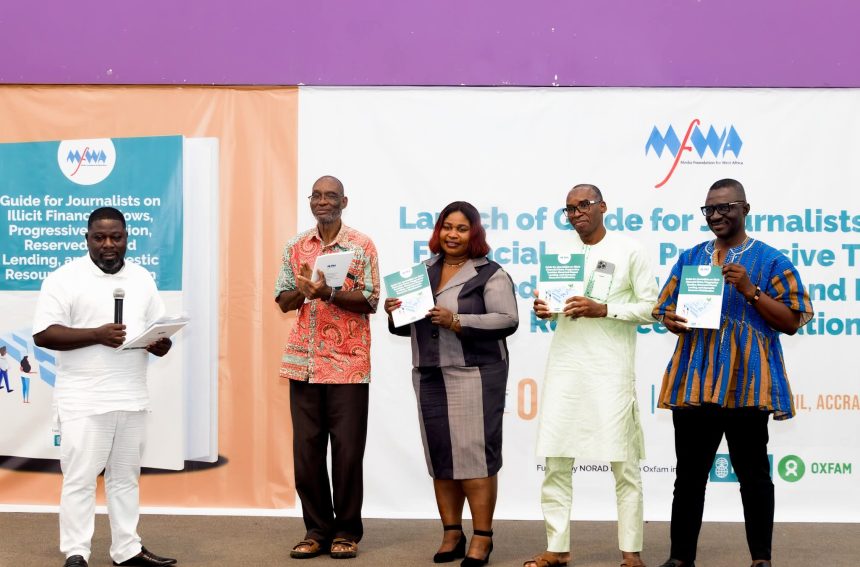 GJA Vice President, Rebecca Ekpe (middle) with dignitaries at the launch of Media Guide on Illicit Final Flows Reporting in Ghana.