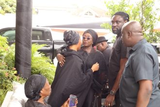 Minister for Tourism, Culture and Creative Arts, Madam Abla Dzifa Gomashie commiserates with Lumba Family.