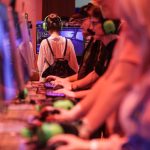 Computer gamers test "World of Warcraft" during the Gamescom video games fair in Cologne, which runs from 20 to 24 August 2025.