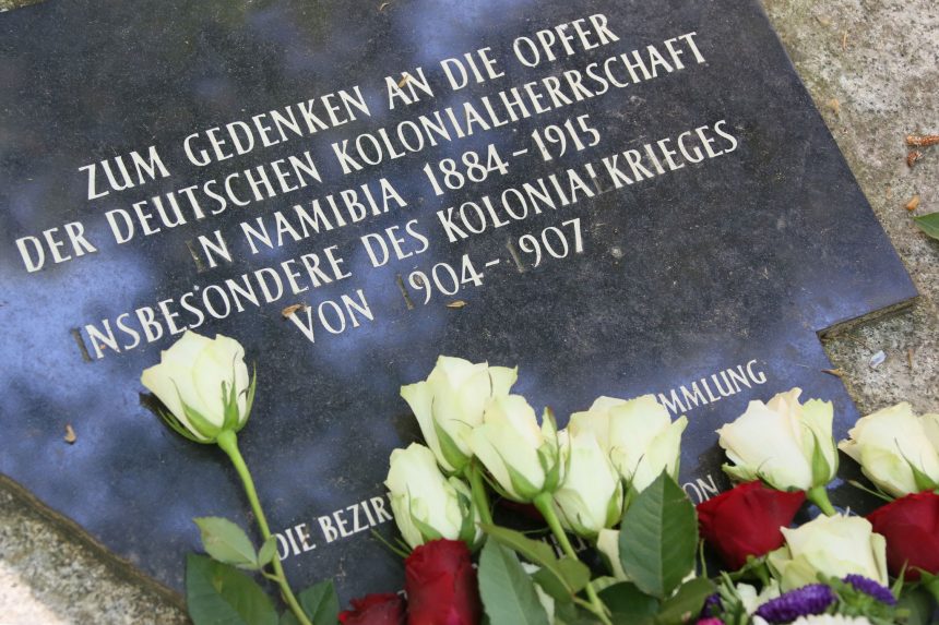 Flowers lie on July 7, 2015, at the memorial stone for the victims of German colonial rule in present-day Namibia at the Garrison Cemetery in Berlin.