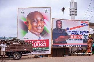 Akwatia by election billboards for NPP's Solomon Kwame Asumadu and NDC's Bernard Bediako Baidoo.