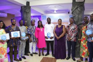 Overall GJA Journalist of the Years, Bono Region, Biiya Ali (in white shirt) flanked by GJA Vice President, Rebecca Ekpe (on the left) and GJA Bono Regional CHairperson, Mrs Regina Benneh-Siaw (on the left), and other awardees.