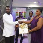 GJA Vice President, Rebecca Ekpe presents Overall GJA Journalist of the Year in Bono Ahafo Region to Daily Graphic's Biiya Mukusah Ali