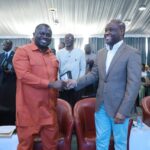 Mr. Dwumfour, GJA President (L) and Minister in Charge of Government Communications, Felix Kwakye Fosu
