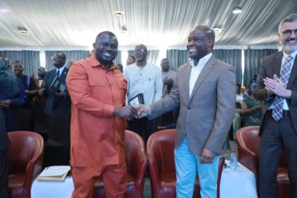 Mr. Dwumfour, GJA President (L) and Minister in Charge of Government Communications, Felix Kwakye Fosu