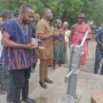 MCE for Ketu North, Rev. Martin Amenaki commissions borehole for Dunyokorpe in Afife.