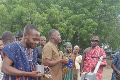 MCE for Ketu North, Rev. Martin Amenaki commissions borehole for Dunyokorpe in Afife.