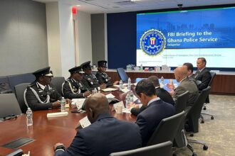 IGP Tettech Yohonu briefing FBI Agents in New York City.