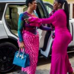Nana Aba Anamoah (R) welcomes host Maame Guymfua Yeboah to ''Seat of Strength'', event.