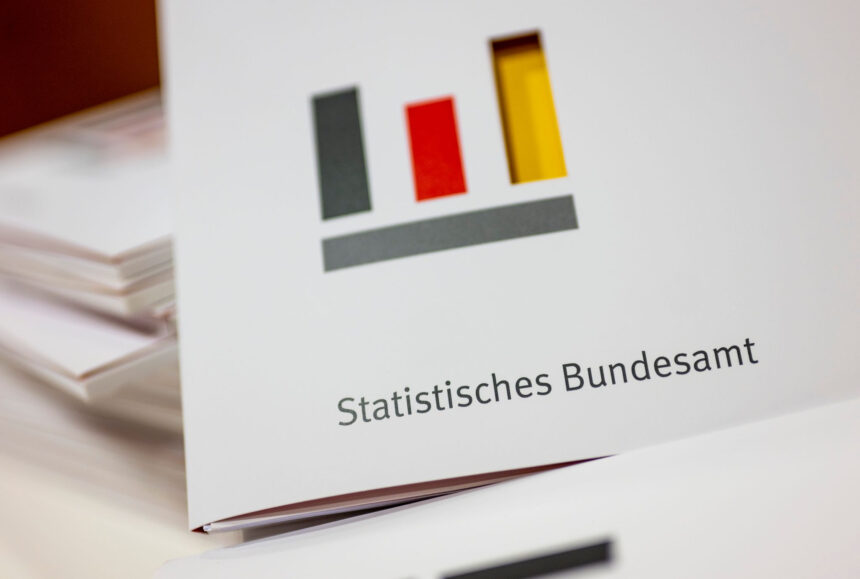 13 January 2023, Berlin: Folders labelled Federal Statistical Office and the office's logo lie on a table during a press conference. Photo: Monika Skolimowska/dpa