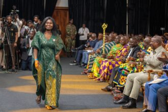 Rachel Kakraba in majestic walk to receive Award for Best Reporting in Features Radio Category, receives applause from President Mahama et al at 29th GJA Awards.