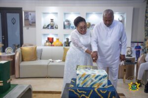 President Mahama and Lordina receive the clergy at home on his 67th Birthday- Time to cut the cake.