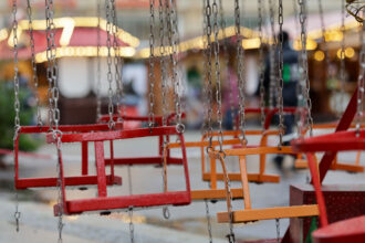 A chain carousel is pictured at the Magdeburg Christmas Market 2025. Photo: Matthias Bein/dpa