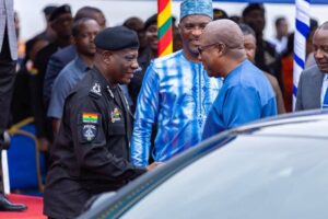 IGP Yehono (Left)with President Mahama(R)