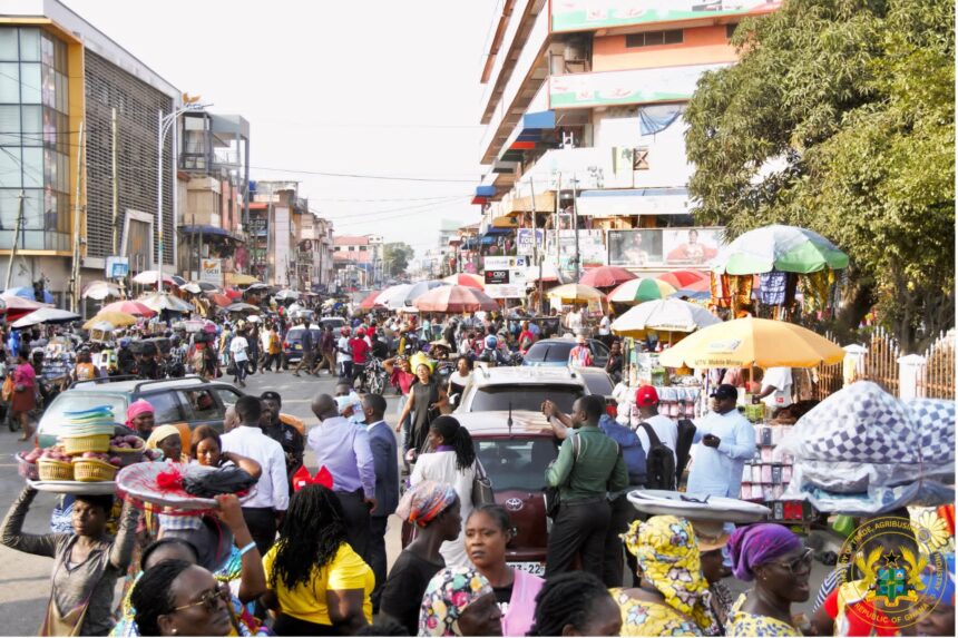 Trade Minister at Markets in Accra, advocating fair pricing.