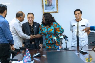 Trade Minister, Madam Elizabeth Ofosu-Adjare,  (in print) meets steel manufacturers.