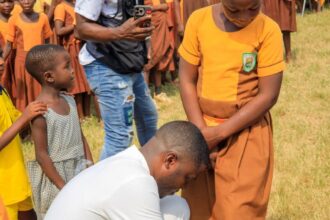 MP For Ketu North, Edem Agbana gifts pupils shoes, bags, books oh his birthday.