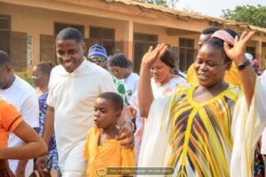 MP For Ketu North, Edem Agbana gifts pupils shoes, bags, books oh his birthday.