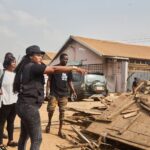 Tema Metropolitan Assembly Chief Executive, Ebi Bright (in black) leads clean-up campaign in city.