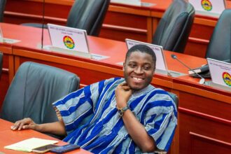 MP for Ketu North- Edem Agbana in Fugu in Parliament.
