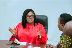World Vision Ghana, led by its National Director, Tinah Mukunda,(Second Right) meets Gender Minister, Dr . Agnes Naa Momo Lartey (in red)