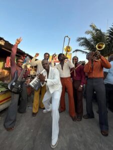 Okyeame Kwame in White
