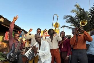 Okyeame Kwame in White