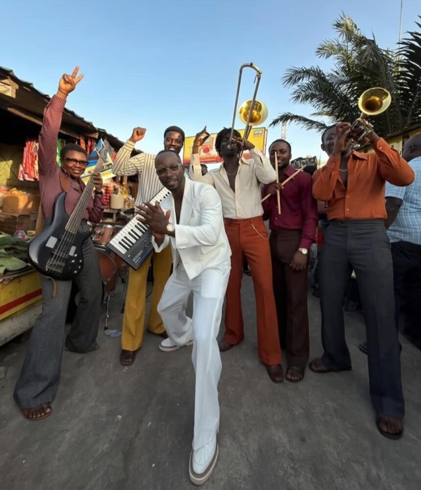 Okyeame Kwame in White