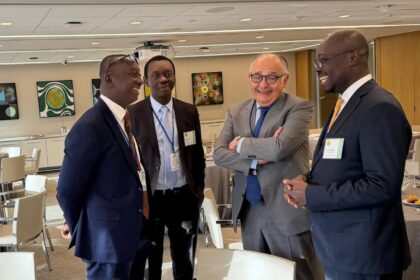 Finance Minister Ato Forson-Right with investors in US.