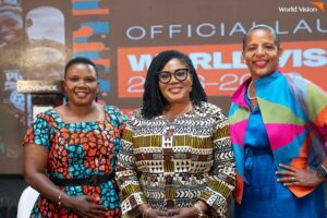 Gender Minister, Dr. Naa Momo Lartey-Middle with Officials of World Vision.