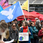 Participants at the start of the traditional Rhine-Ruhr Easter March in Duisburg. The peace march ends on Easter Monday in Dortmund. Photo: Roberto Pfeil/dpa