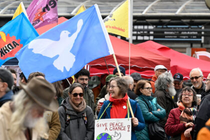 Participants at the start of the traditional Rhine-Ruhr Easter March in Duisburg. The peace march ends on Easter Monday in Dortmund. Photo: Roberto Pfeil/dpa