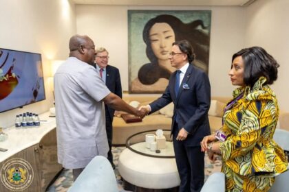 President John Mahama-left- arrives in London.