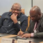 Ghana' Ambassador to US- Left- meets with officials from Microsoft.